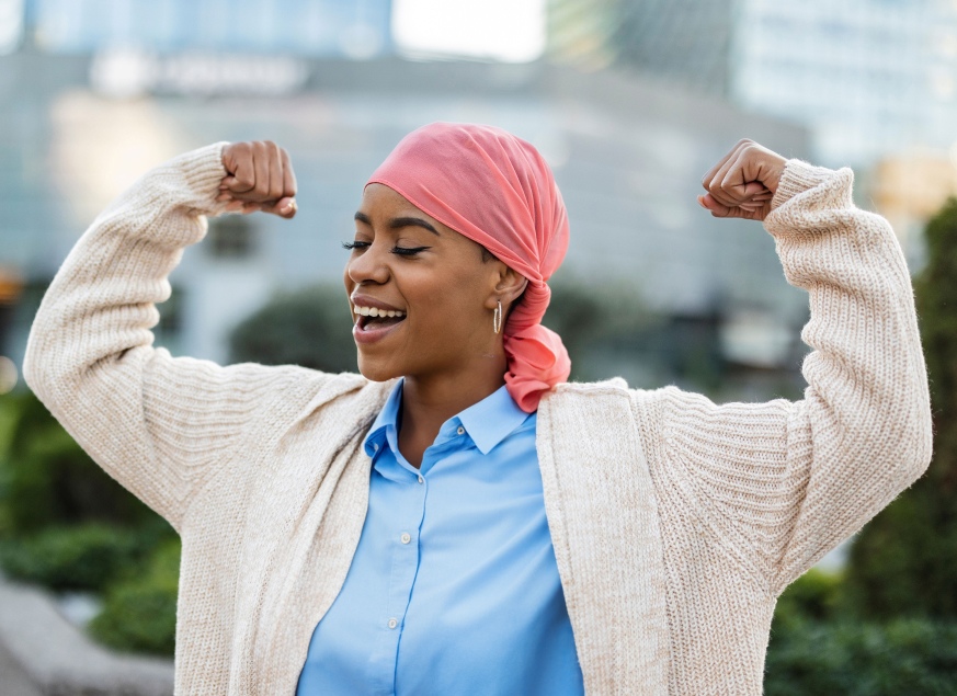 a woman with a pink hat